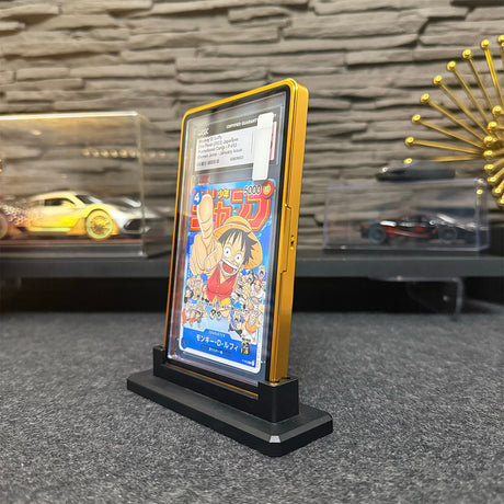 Gold aluminum case for PSA graded card display.