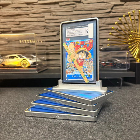 Silver aluminum case for PSA graded card display.